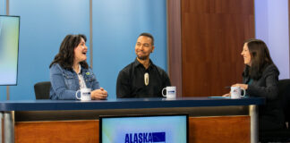 Two women and a man sit at a desk on the set of Alaska Insight talking about Alaska Native representation in media.