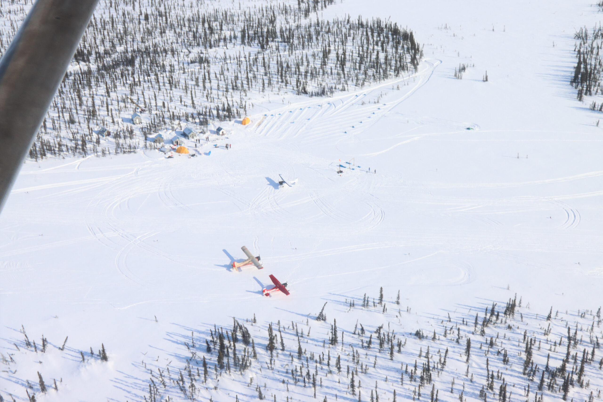 an aerial view of a snowy checkpoint