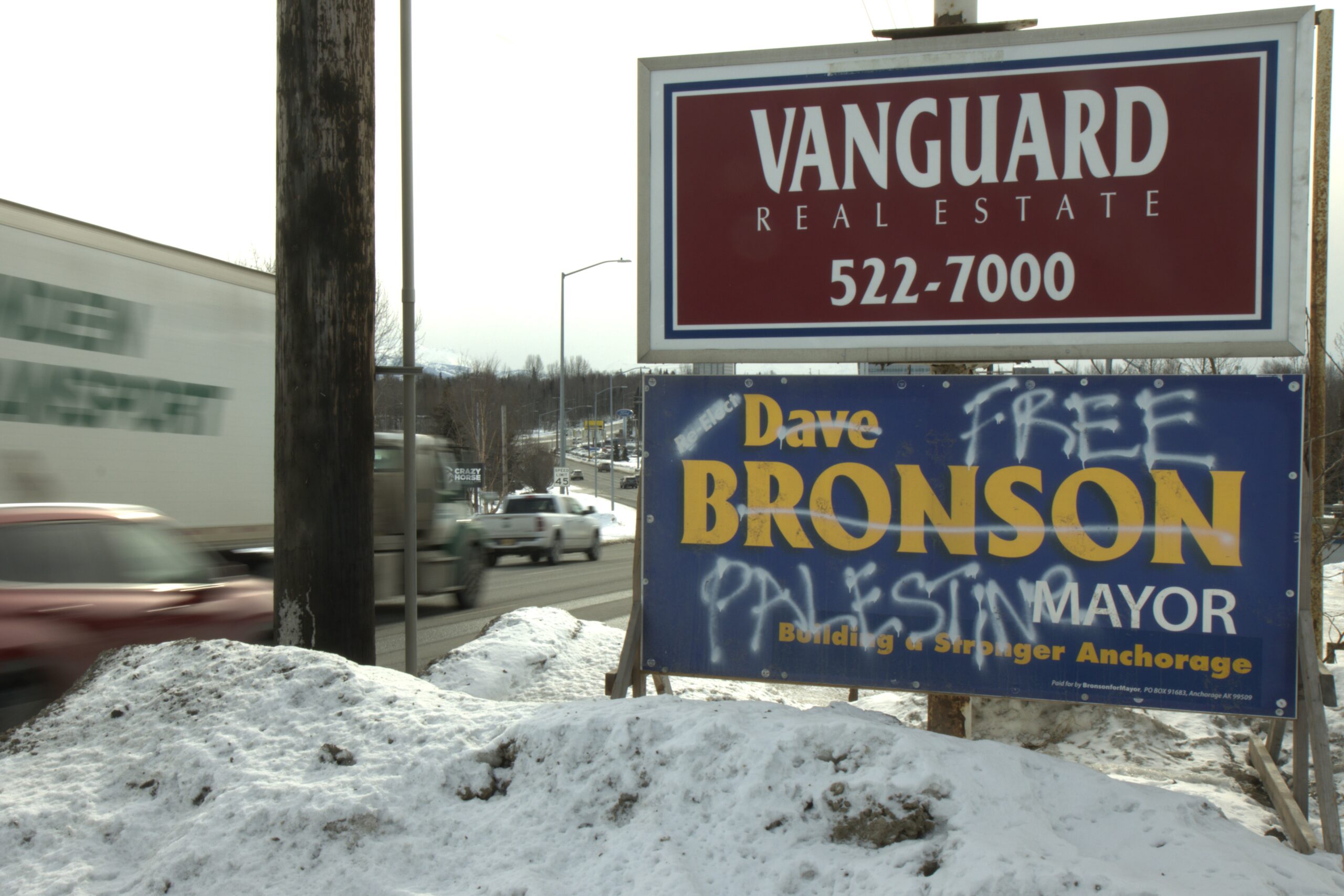 A campaign sign supporting Mayor Dave Bronson's reelection vandalized with "Free Palestine"