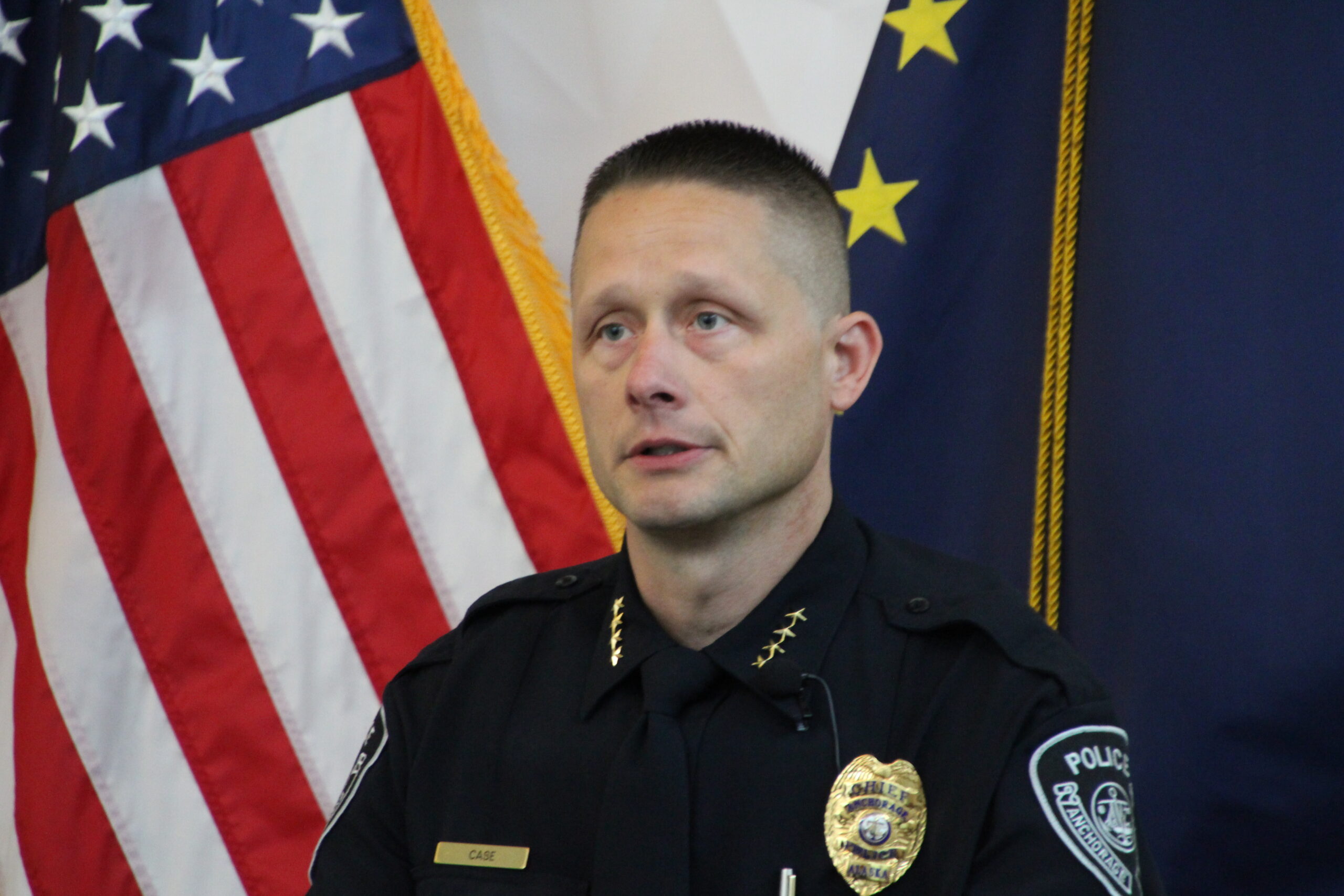 a police officer at a podium