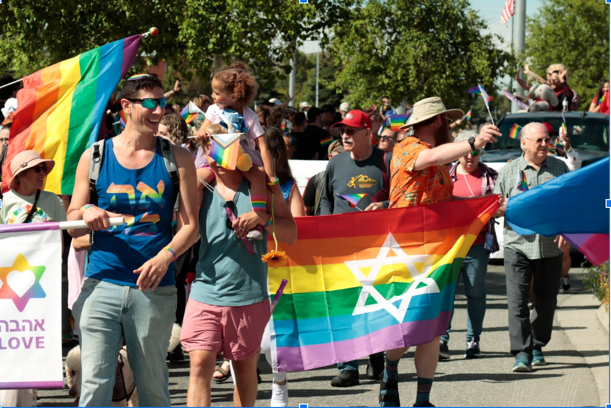 Members of Beth Sholom religion march successful nan pridefulness parade.