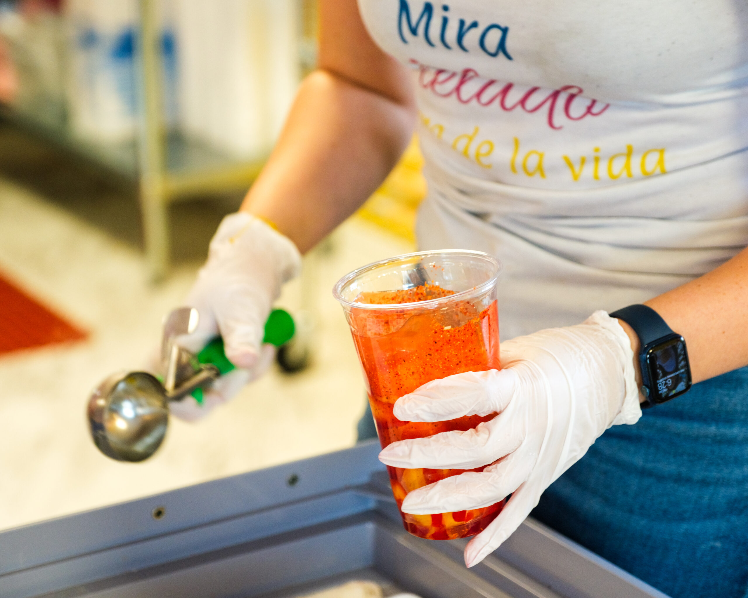 a personification prepares a colorful drink