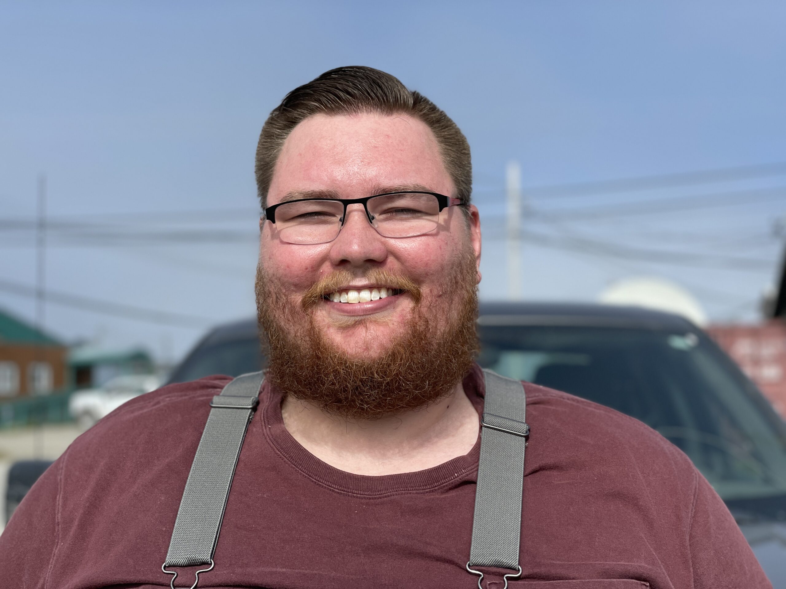 Bearded Man in maroon t-shirt