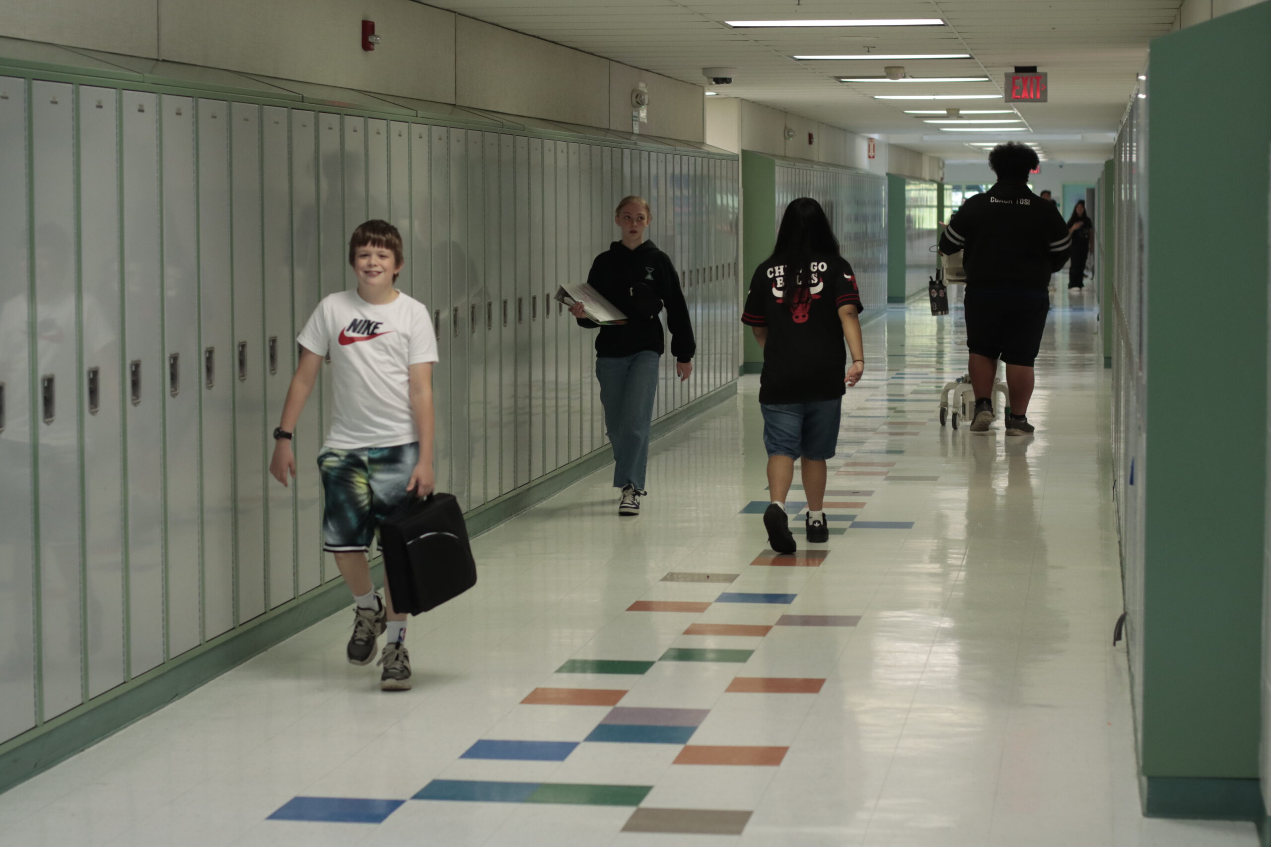 Students walk through the halls at Wendler Middle School.