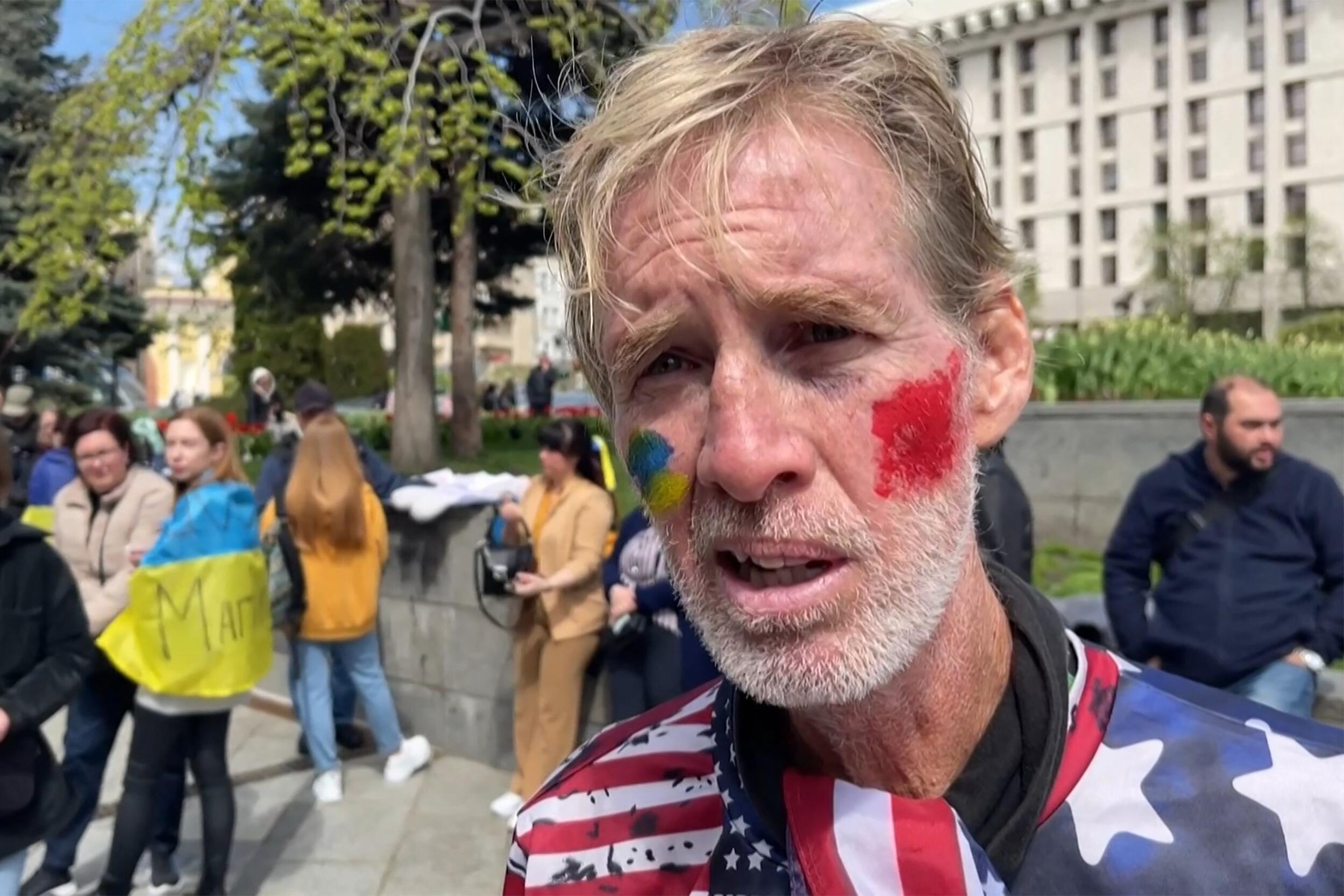 a man successful a USA shirt