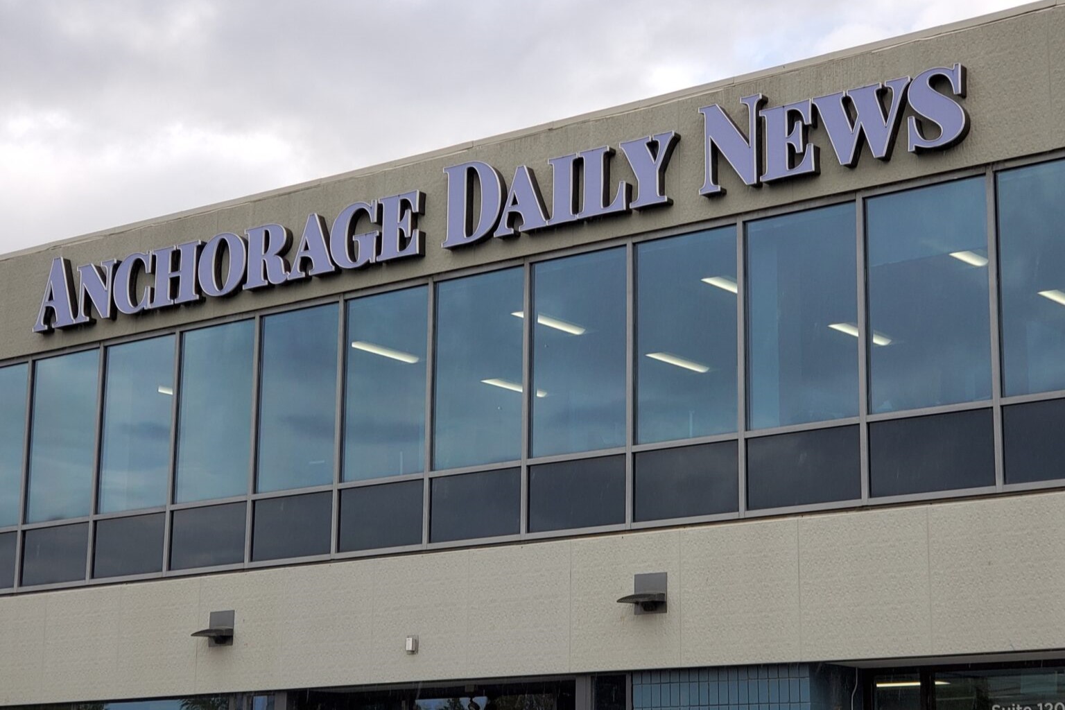 a photo of a building that says Anchorage Daily News