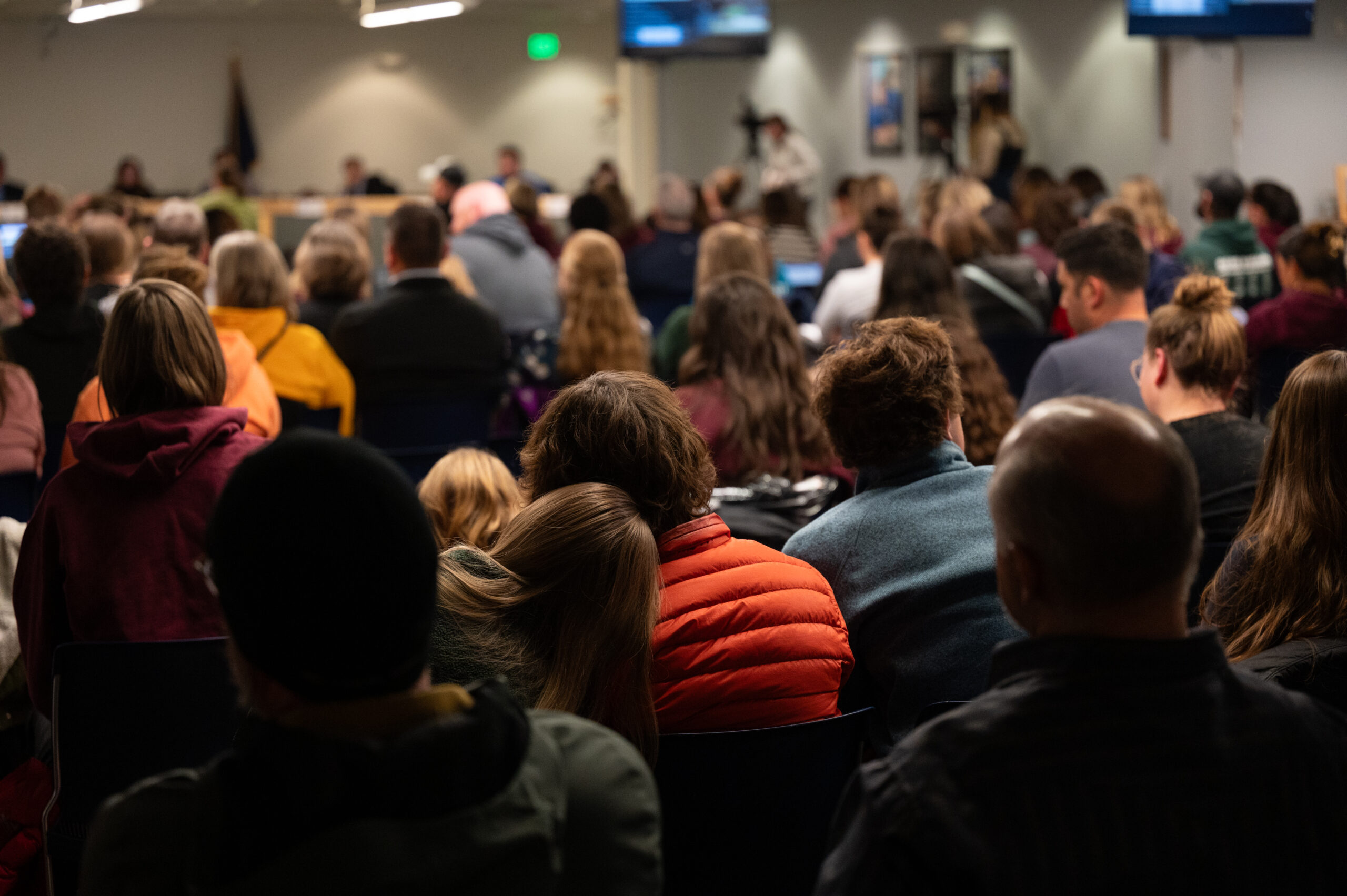 Bear Valley parents gather at a school board meeting to protest a school closure proposal in Anchorage