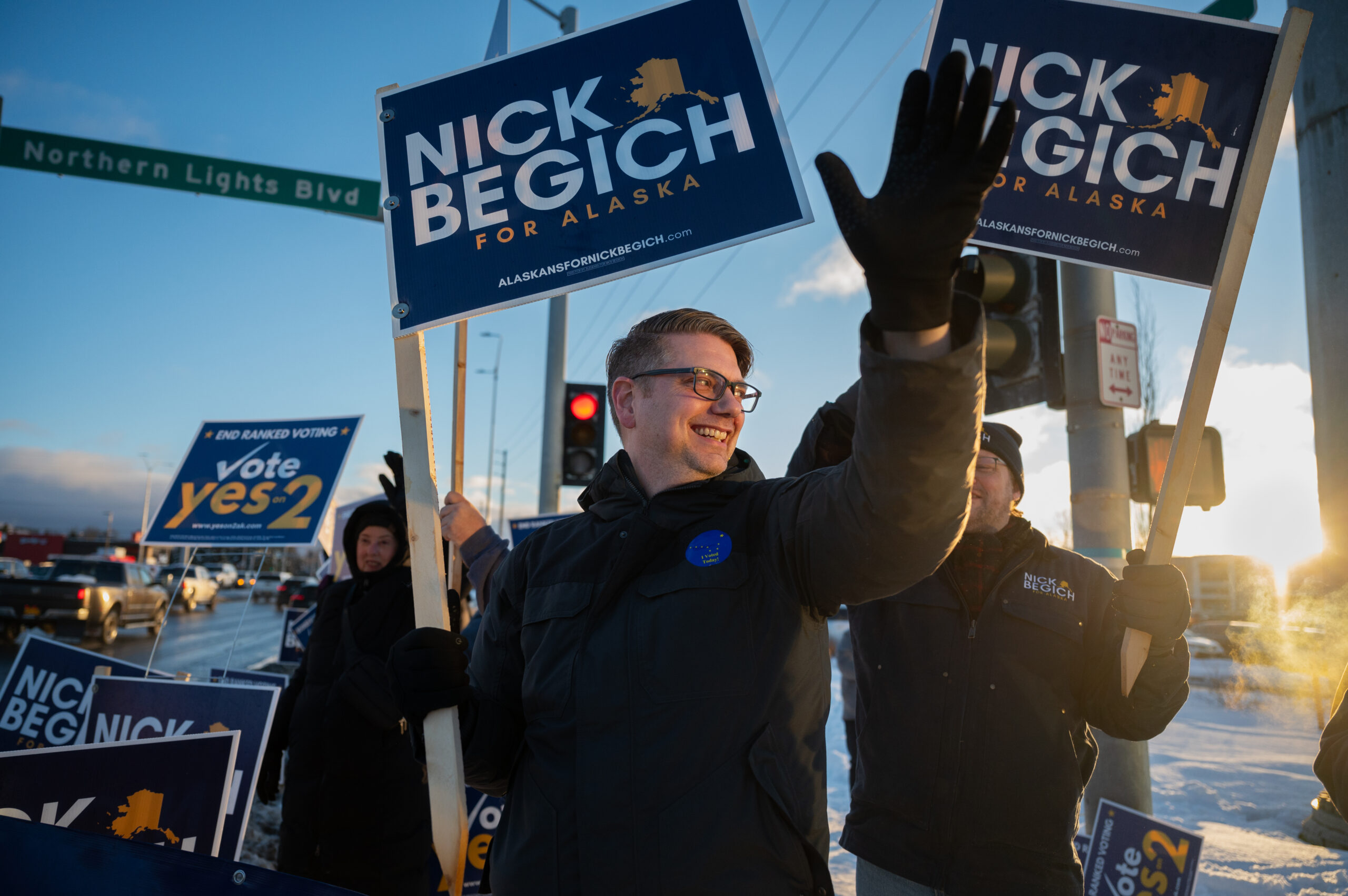 a man holding signs