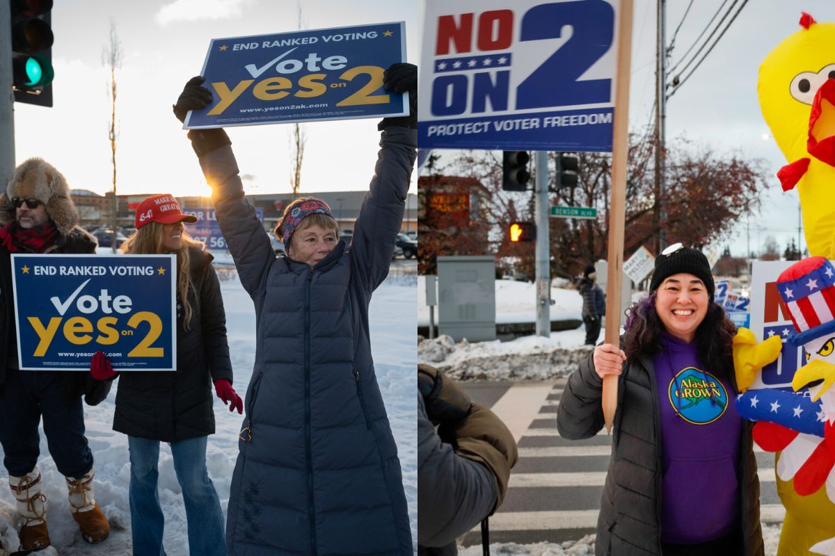 people wave signs