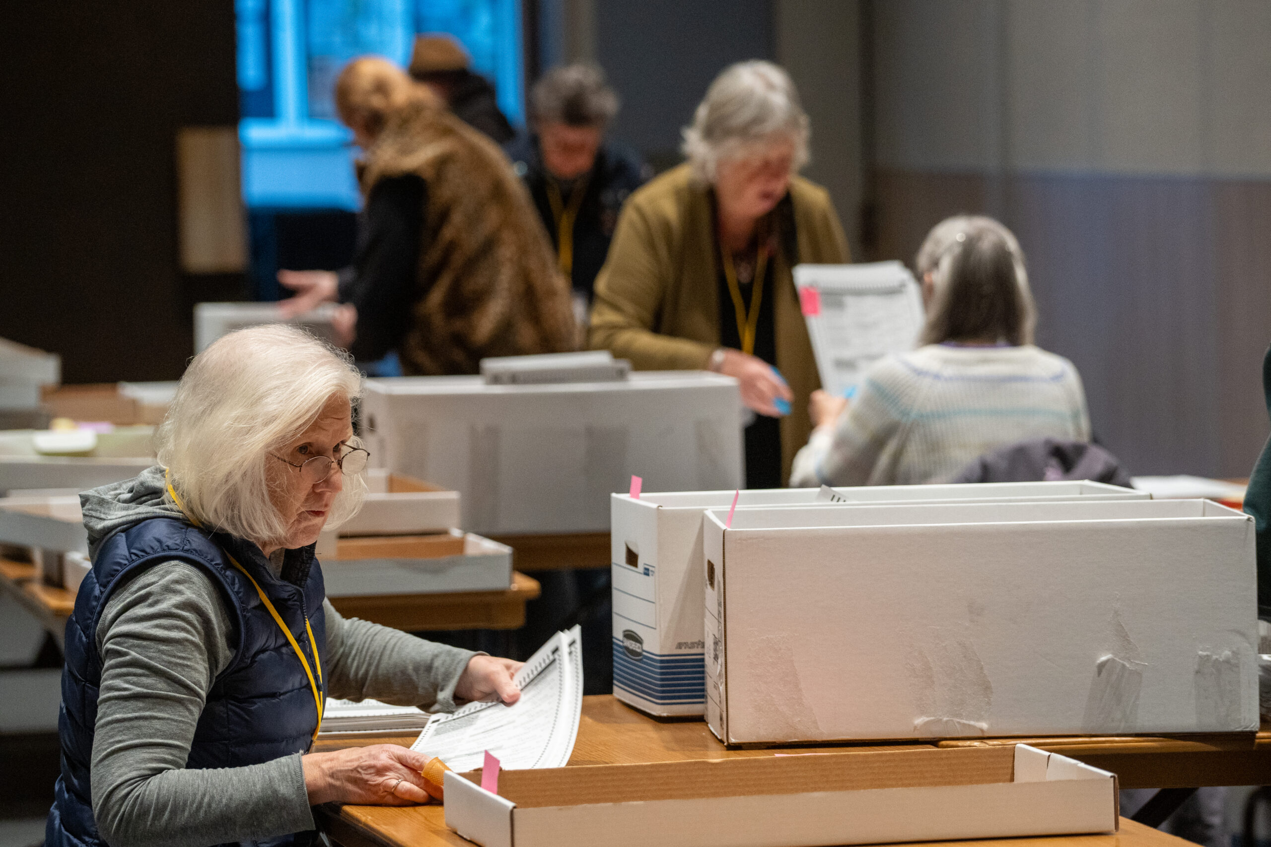 people counting ballots