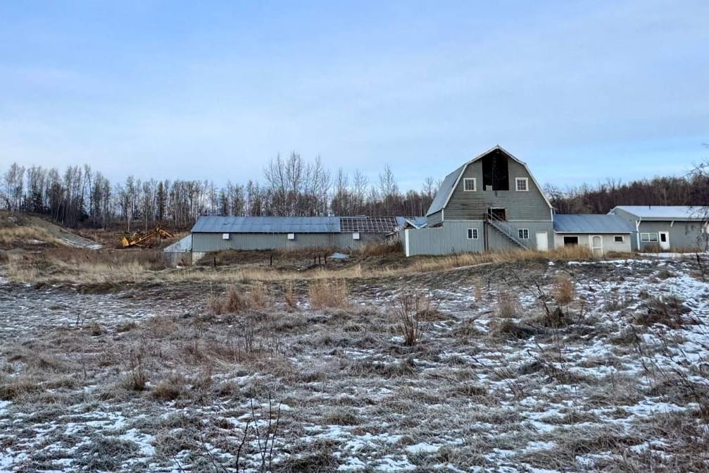 a barn on a frosty morning