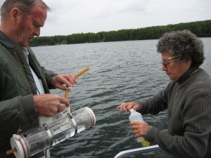 Pat and Marie Sweeny take a water sample